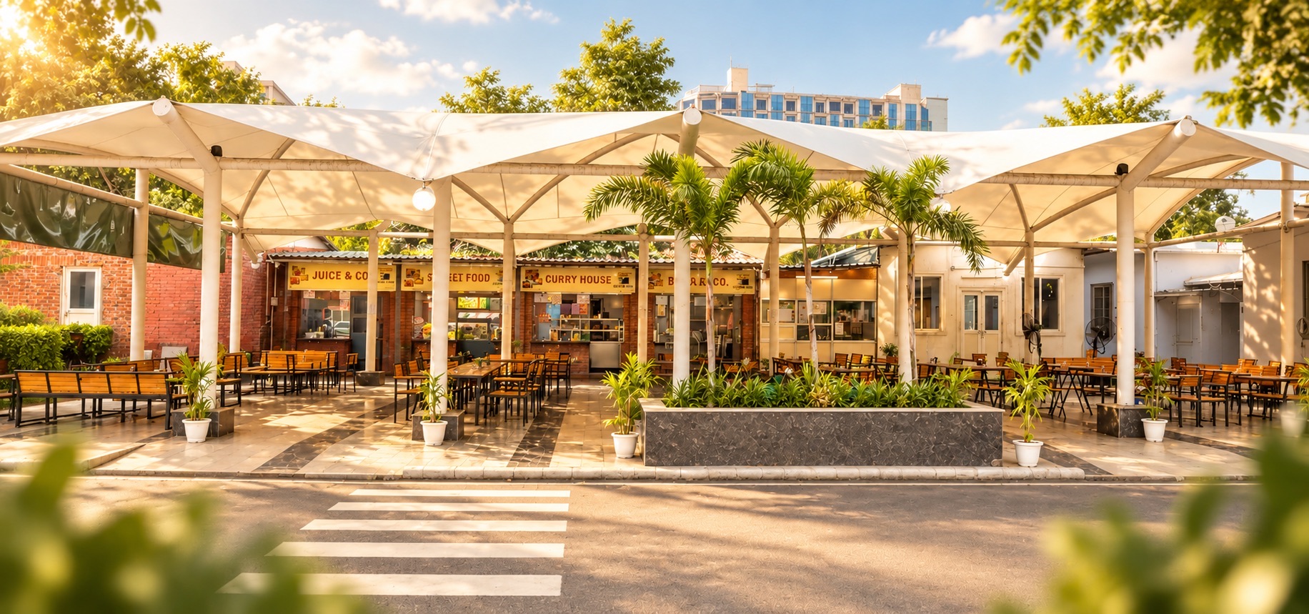 Seating under the Street Hub canopies, lined with palms